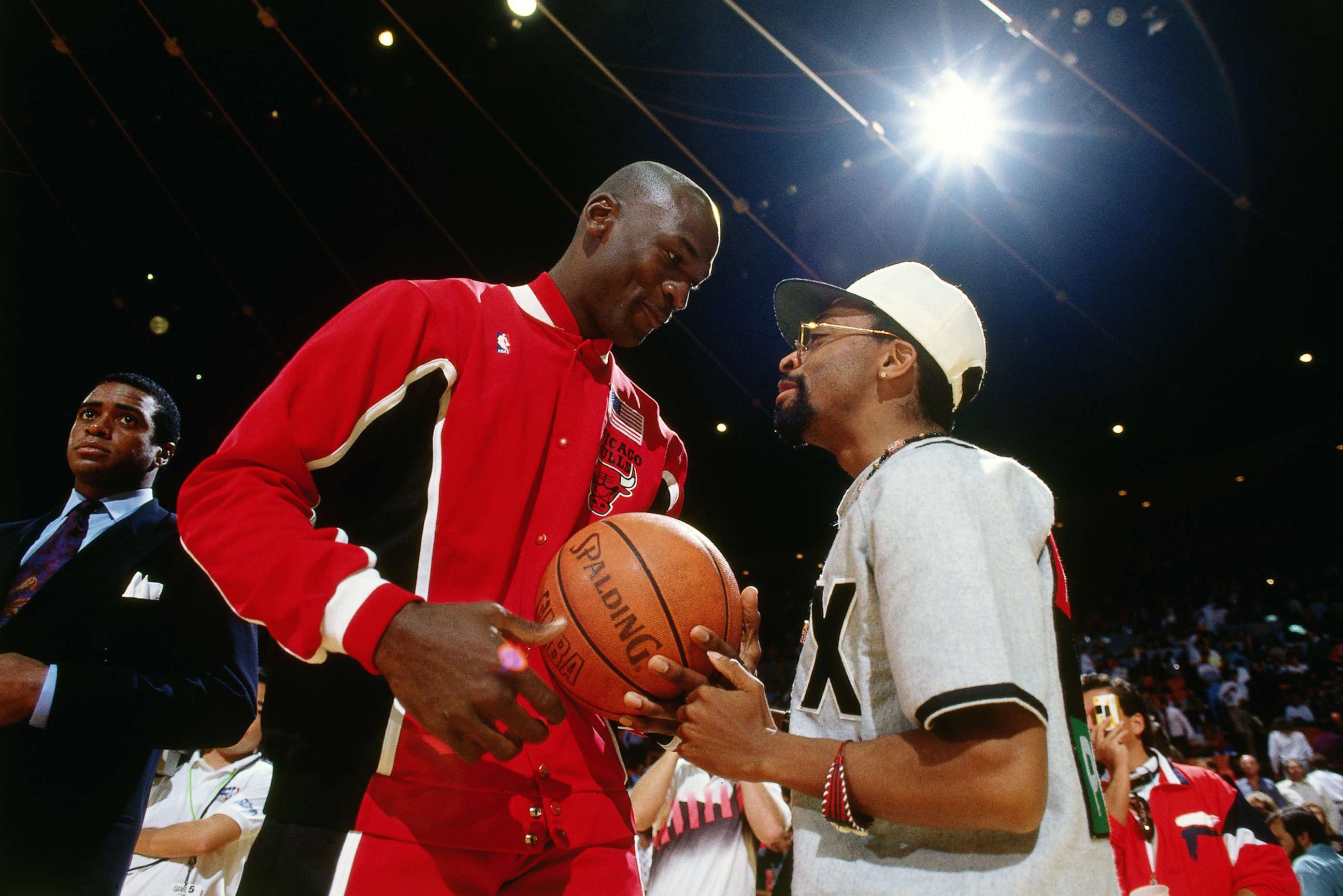 PHOTO: Michael Jordan talks with Spike Lee during Game Five of the 1991 NBA Finals on June 12, 1991 at the Great Western Forum in Inglewood, Calif.