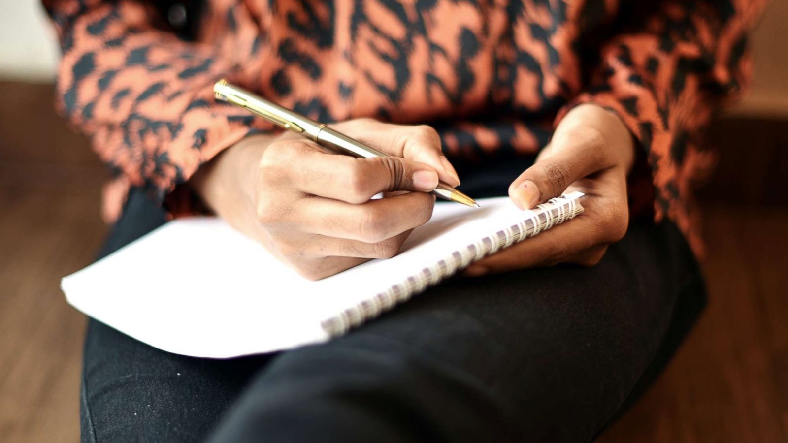 PHOTO: A woman writes in a journal in this undated stock photo.