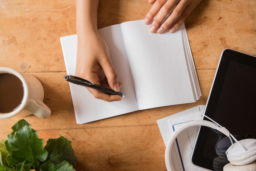 PHOTO: A person appears to be using a journal in this stock photo.