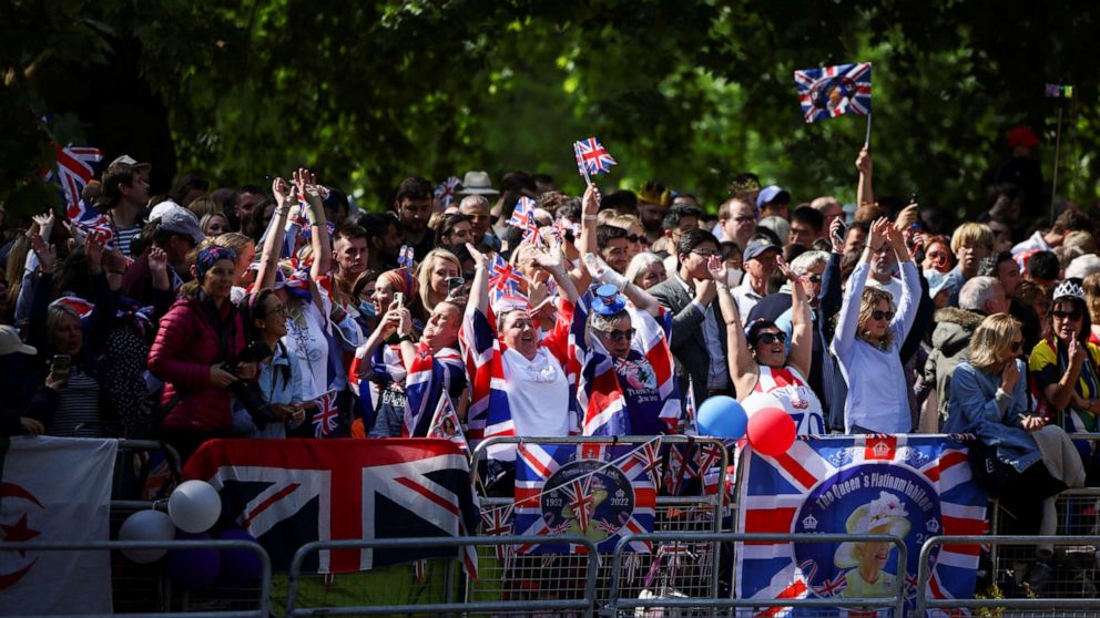PHOTO: People gather along The Mall as they attend the Queen's Platinum Jubilee celebrations in London, June 2, 2022.