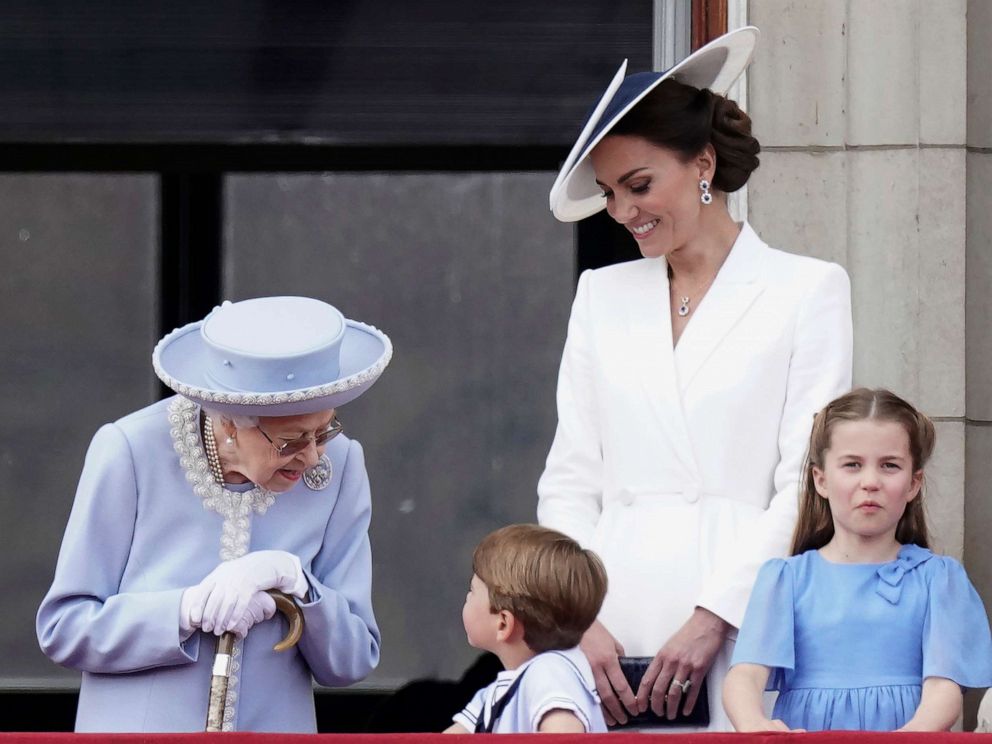 PHOTO: Queen Elizabeth II, Kate, Duchess of Cambridge, Prince Louis, Princess Charlotte watch from the balcony of Buckingham Place after the Trooping the Color ceremony in London, June 2, 2022.
