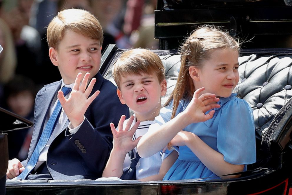 PHOTO: Prince George, Prince Louis and Princess Charlotte ride in a carriage as they attend the celebration of Britain's Queen Elizabeth's Platinum Jubilee, in London, June 2, 2022.