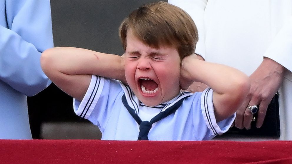 PHOTO: Prince Louis of Cambridge reacts as he watches a special flypast from Buckingham Palace balcony following the Queen's Birthday Parade, the Trooping the Color, as part of Queen Elizabeth II's platinum jubilee celebrations, in London, June 2, 2022.