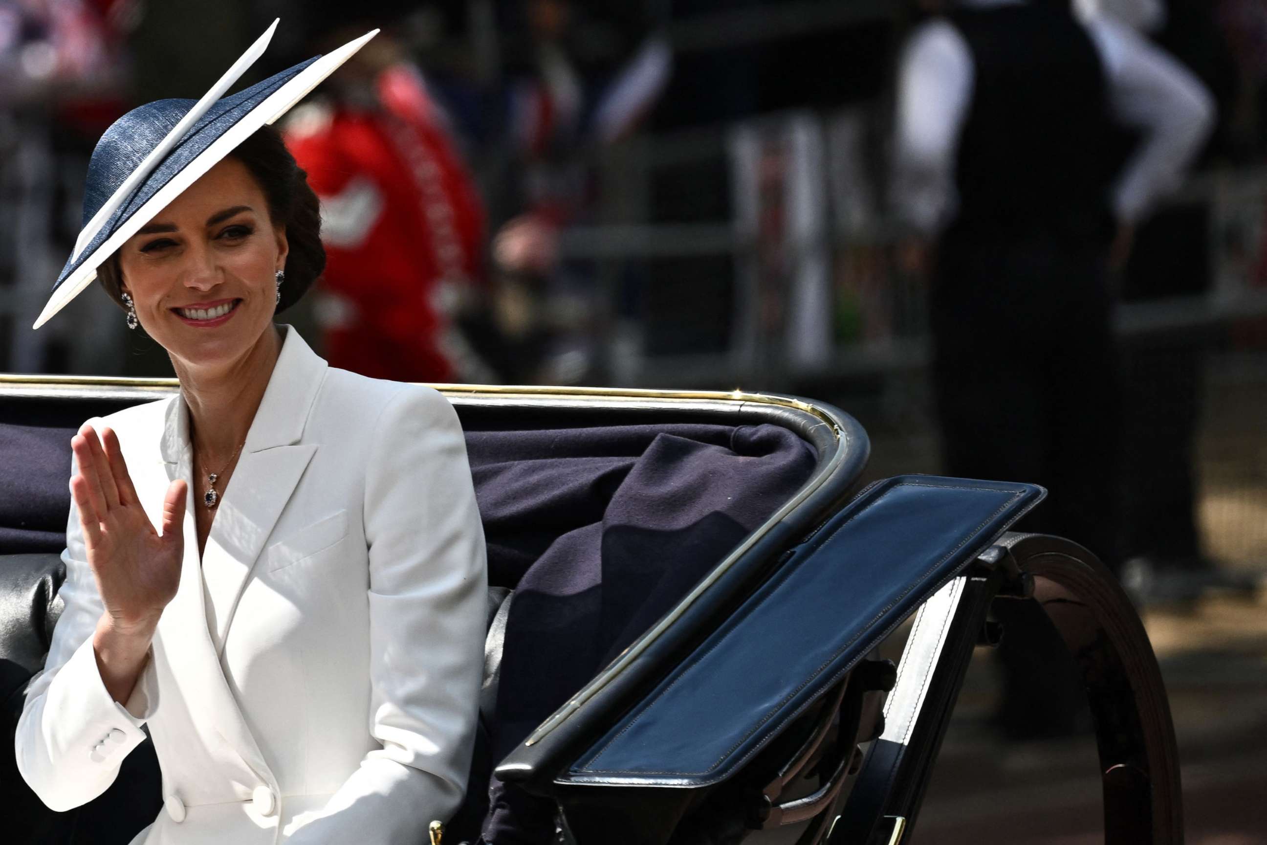 PHOTO: Britain's Catherine, Duchess of Cambridge, waves to the public as she arrives on a carriage to attend the Queen's Birthday Parade, the Trooping the Color, as part of Queen Elizabeth II's platinum jubilee celebrations, in London, June 2, 2022.