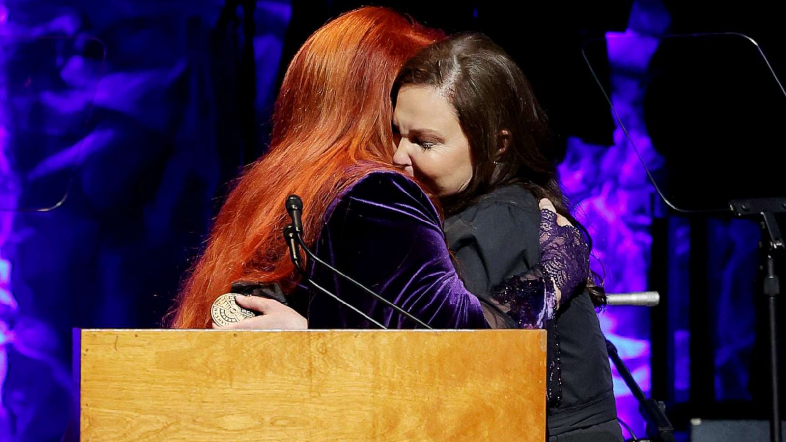 PHOTO: Inductee Wynonna Judd and Ashley Judd speak onstage for the class of 2021 medallion ceremony at Country Music Hall of Fame and Museum on May 1, 2022 in Nashville, Tenn.