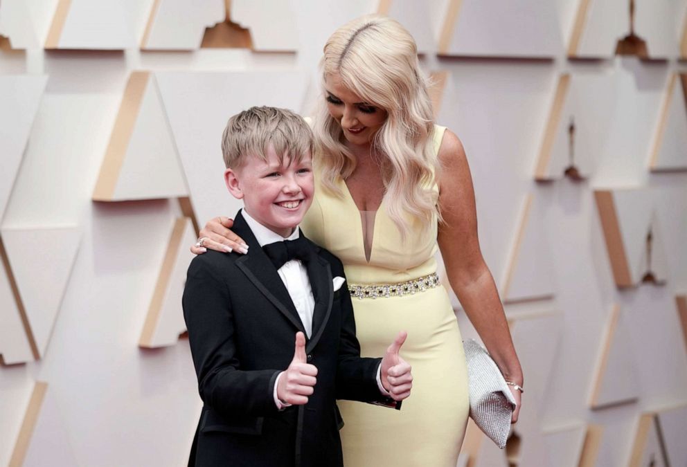 PHOTO: Jude Hill, left, and Shauneen Hill arrive at the Oscars, March 27, 2022, at the Dolby Theatre in Los Angeles.