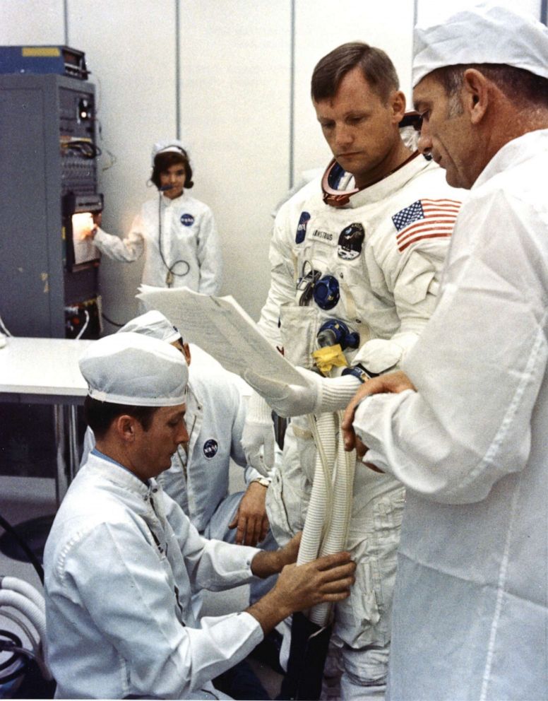 PHOTO: Judy Sullivan working at NASA with Neil Armstrong. 