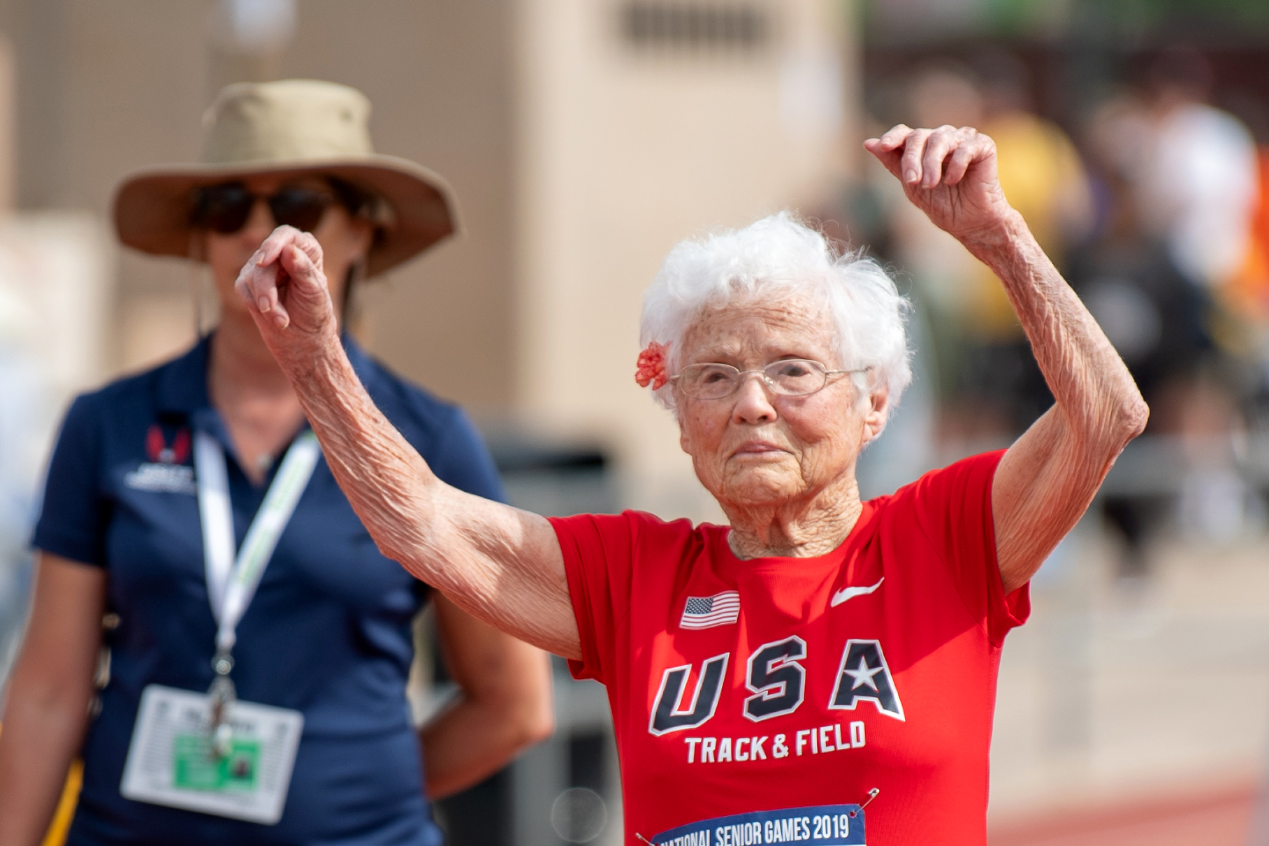 PHOTO: Julia Hawkins celebrates her win at the 50-meter race at the 2019 National Senior Games in Albuquerque, New Mexico.