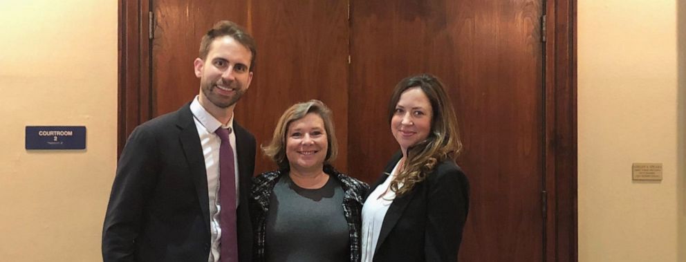 PHOTO: Julie Hilberg, center, stands outside a Texas courtroom with Campaign Legal Center lawyers Mark Gaber, left, and Molly Danahy.