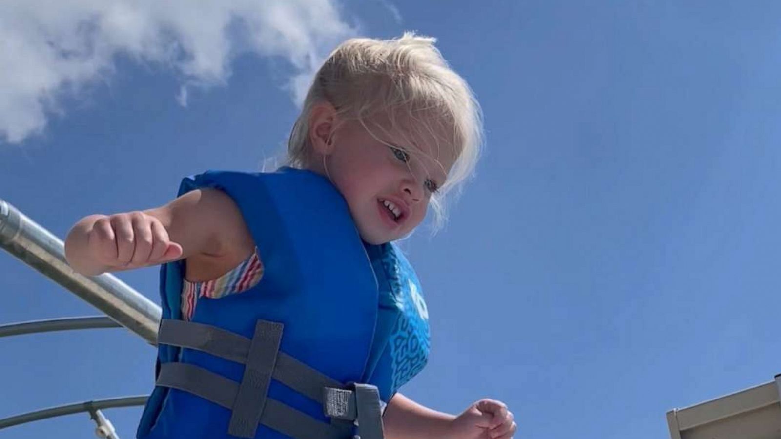 PHOTO: In a video shared by Marli Sayler, Sayler's daughter Bella works up the courage to jump into the water from a dock in Lake Poinsett, South Dakota.