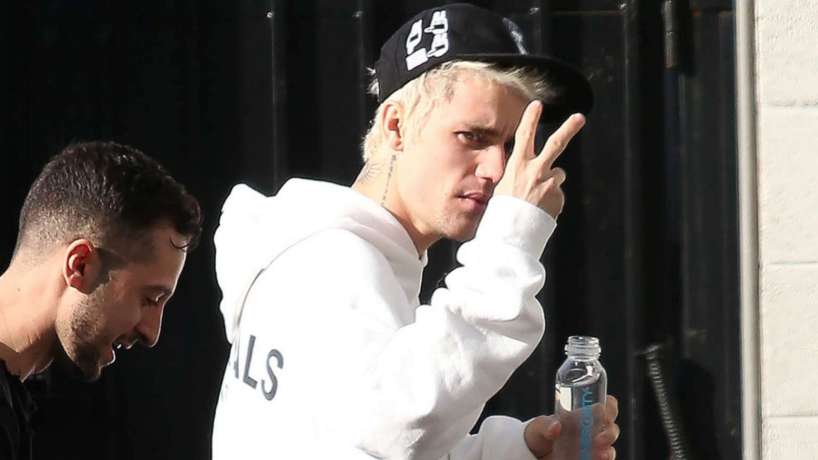 PHOTO: Justin Bieber flashes a gesture at photographers in Los Angeles, Dec. 17, 2019.