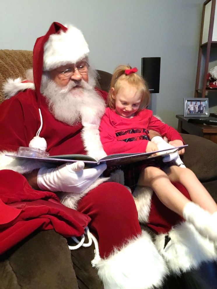 PHOTO: Kaitlynn Weimer with Santa in 2017.