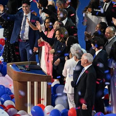 PHOTO: Balloons fall as Vice President and Democratic presidential candidate Kamala Harris waves onstage with family and friends at the end of the fourth and last day of the Democratic National Convention at the United Center, Aug. 22, 2024, in Chicago.