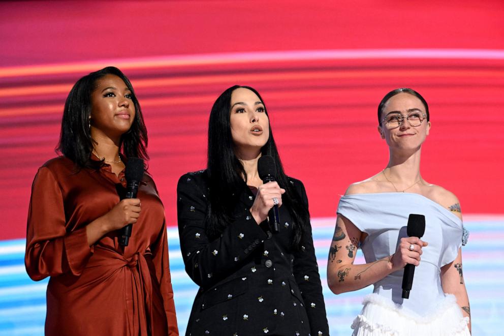 PHOTO: Helena Hudlin, left, Meena Harris, center, and Ella Emhoff speak during the Democratic National Convention, Aug. 22, 2024, in Chicago. 