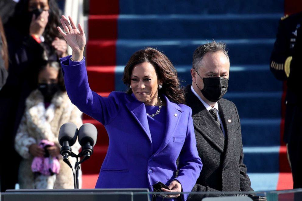 PHOTO: Newly sworn in Vice President Kamala Harris and her husband Doug Emhoff wave at the inauguration of President-elect Joe Biden on the West Front of the U.S. Capitol on Jan. 20, 2021, in Washington, D.C.