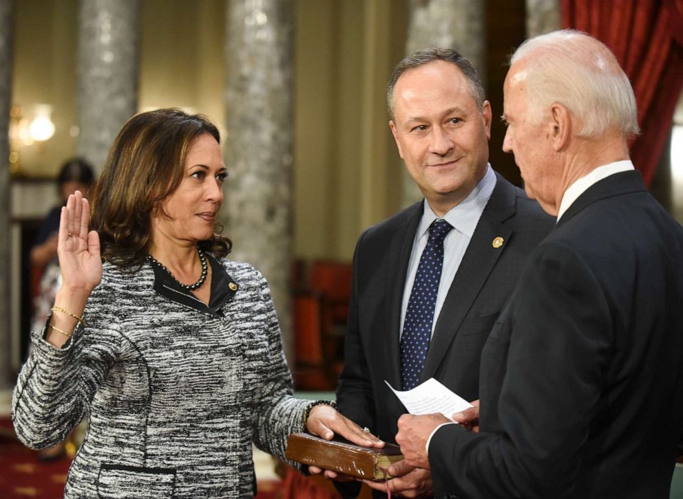 PHOTO: In this Jan. 3, 2017 file photo, Vice President Joe Biden administers the Senate oath of office to Sen. Kamala Harris, as her husband, Doug Emhoff, holds the Bible on Capitol Hill in Washington, D.C., as the 115th Congress begins.