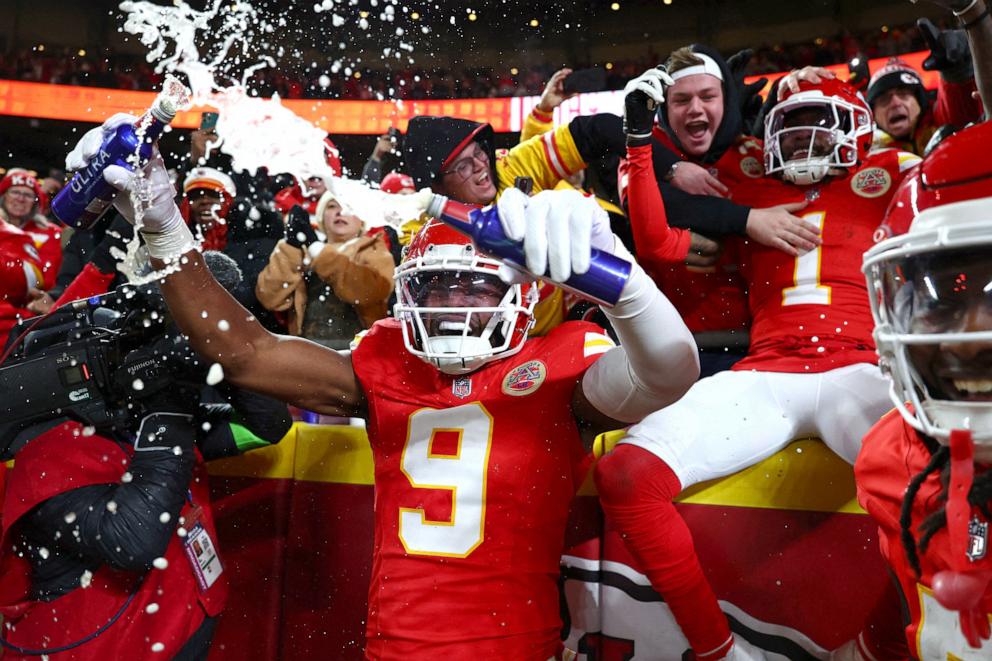 PHOTO: Kansas City Chiefs wide receiver Xavier Worthy (1) and wide receiver JuJu Smith-Schuster (9) react with fans after a touchdown against the Buffalo Bills during the first half in the AFC Championship game at Arrowhead Stadium, Jan. 26, 2025.