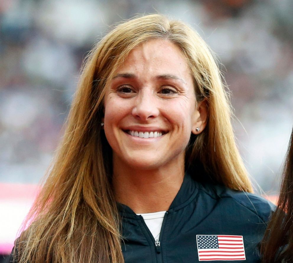 PHOTO: Kara Goucher smiles during the medal ceremonies after the World Athletic Championships in London, Aug. 5, 2017.