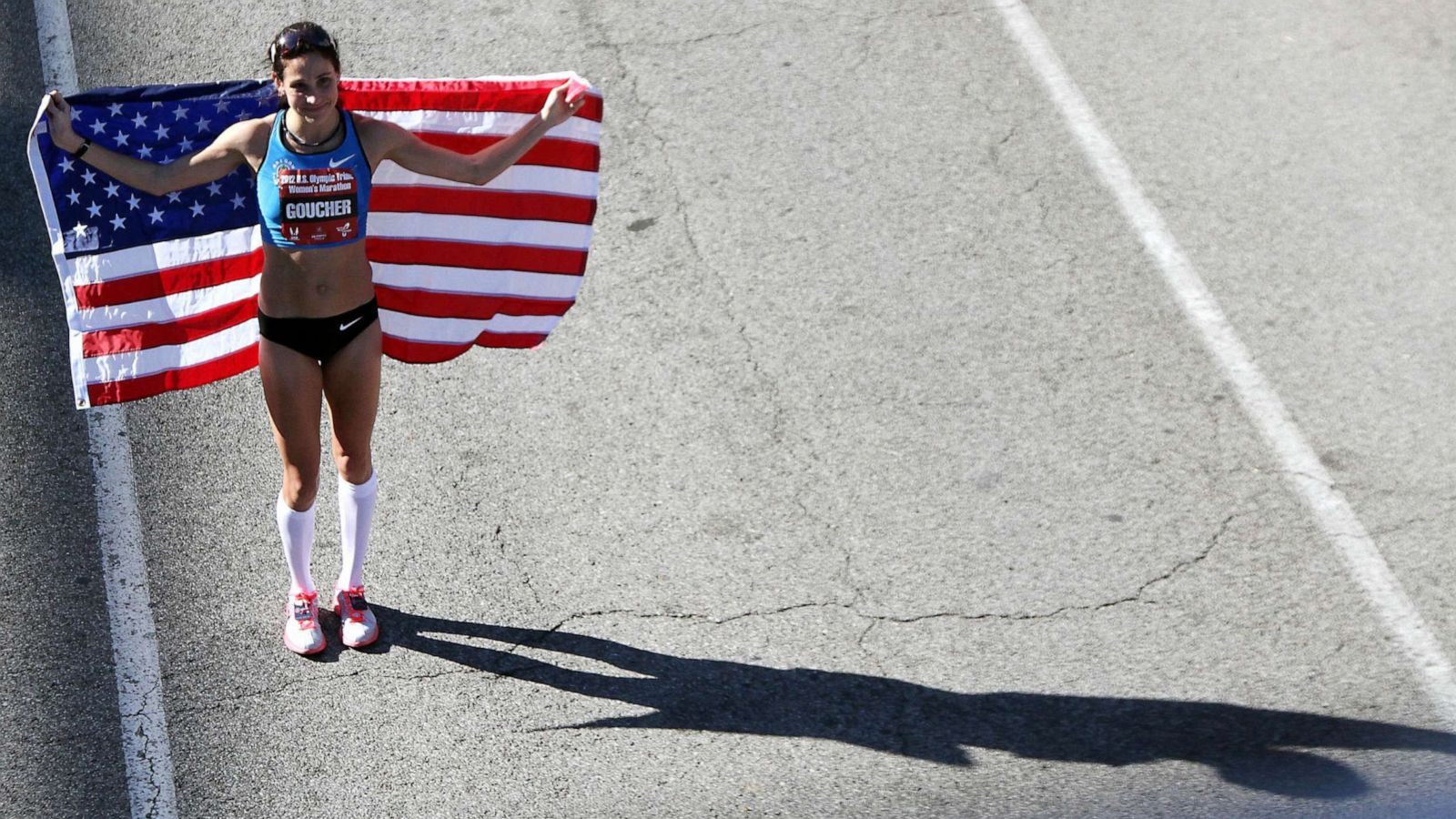 PHOTO: FILE - Kara Goucherm holds an American flag after the U.S. Marathon Olympic Trials, Jan. 14, 2012 in Houston.