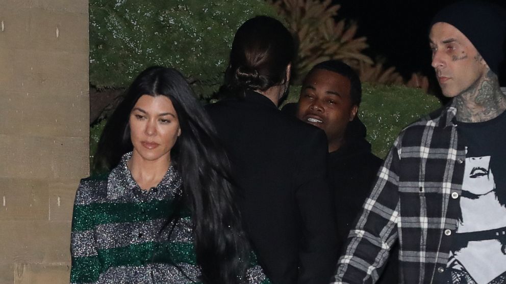 PHOTO: Kourtney Kardashian and Travis Barker are seen at Nobu restaurant, March 20, 2021, in Malibu, Calif.