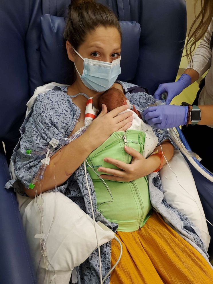 PHOTO: Valerie Kasper holds her son Theodore in the NICU at Children's Hospital of Atlanta at Egleston.