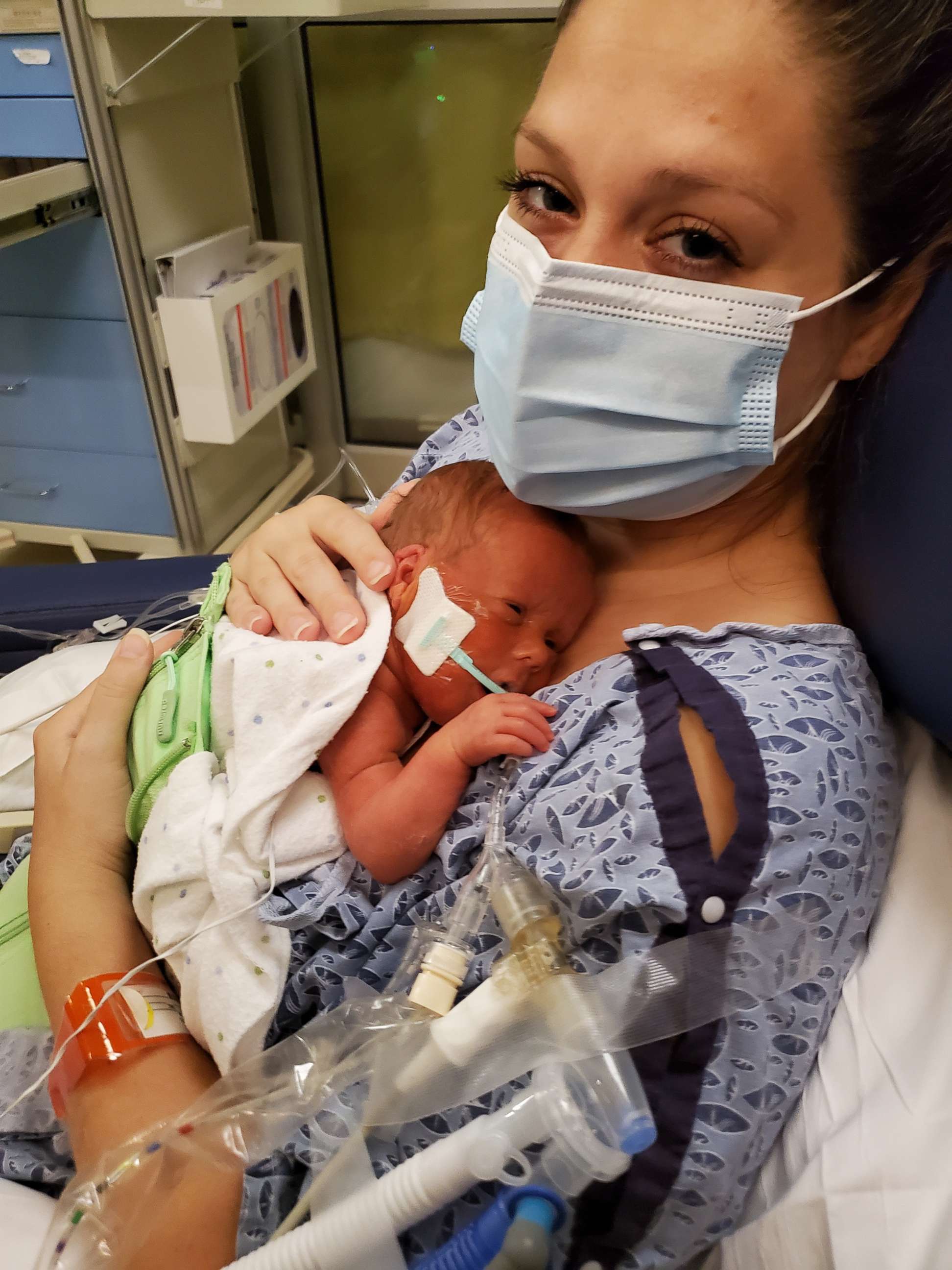 PHOTO: Valerie Kasper holds her son Theodore in the NICU at Children's Hospital of Atlanta at Egleston.