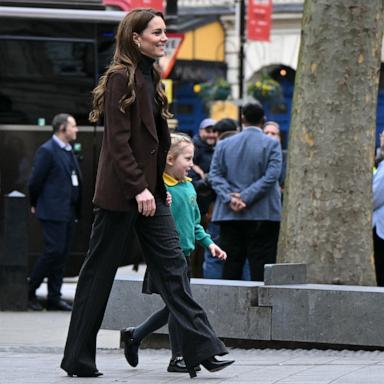 PHOTO: Britain's Catherine, Princess of Wales holds the hand of pupil from All Souls CE Primary School at the National Portrait Gallery in central London, on Feb. 4, 2025.