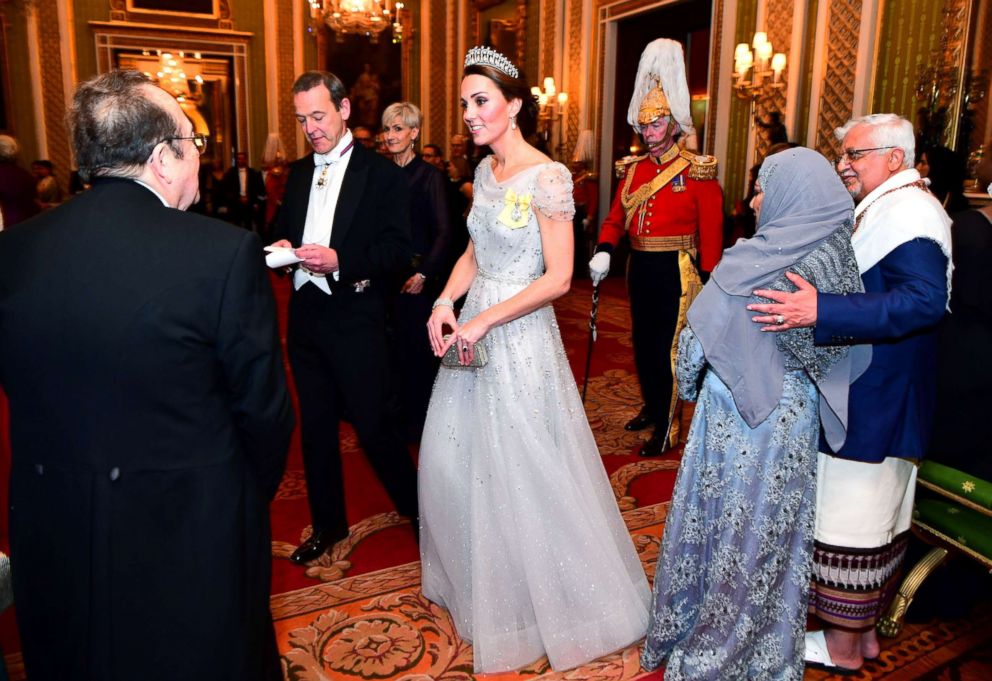 PHOTO: Britain's Catherine, The Duchess of Cambridge, talks to guests at an evening reception for members of the Diplomatic Corps at Buckingham Palace in London, Dec. 4, 2018. 