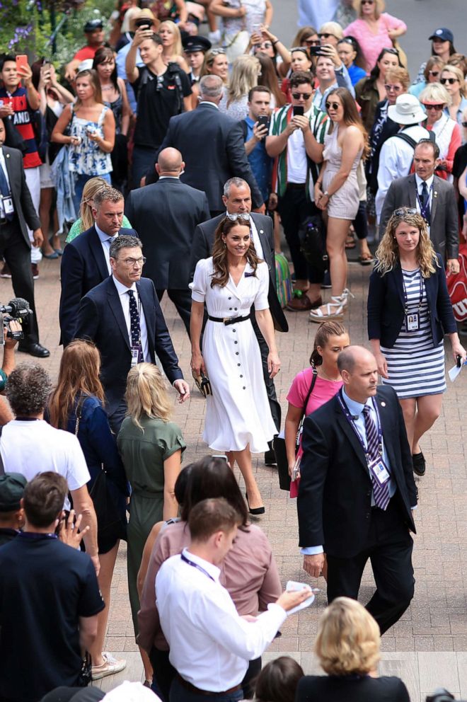 PHOTO: Catherine, Duchess of Cambridge is surrounded as she arrives for Day 2 of The Championships - Wimbledon 2019 at the All England Lawn Tennis and Croquet Club on July 2, 2019 in London.