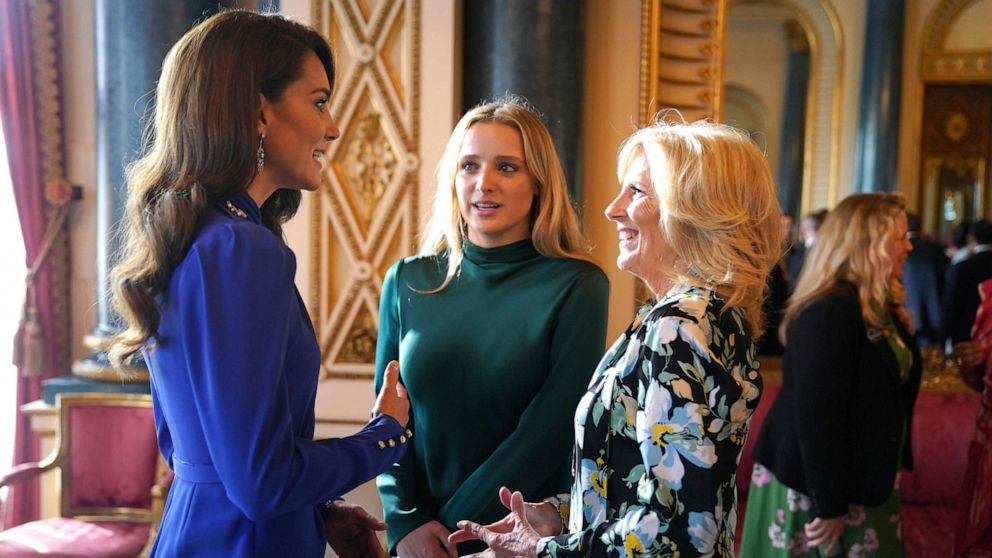 PHOTO: Catherine, Princess of Wales speaks with the first lady of the United States, Jill Biden and her grand daughter Finnegan Biden, during a reception at Buckingham Palace for overseas guests attending the coronation, May 5, 2023 in London.