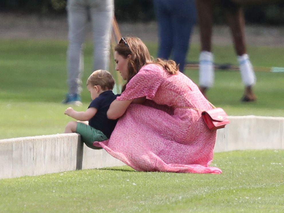 PHOTO: Britain's Kate, Duchess of Cambridge and Prince Louis attend the Royal Charity Polo Day at Billingbear Polo Club, Wokingham, England, on July 10, 2019.