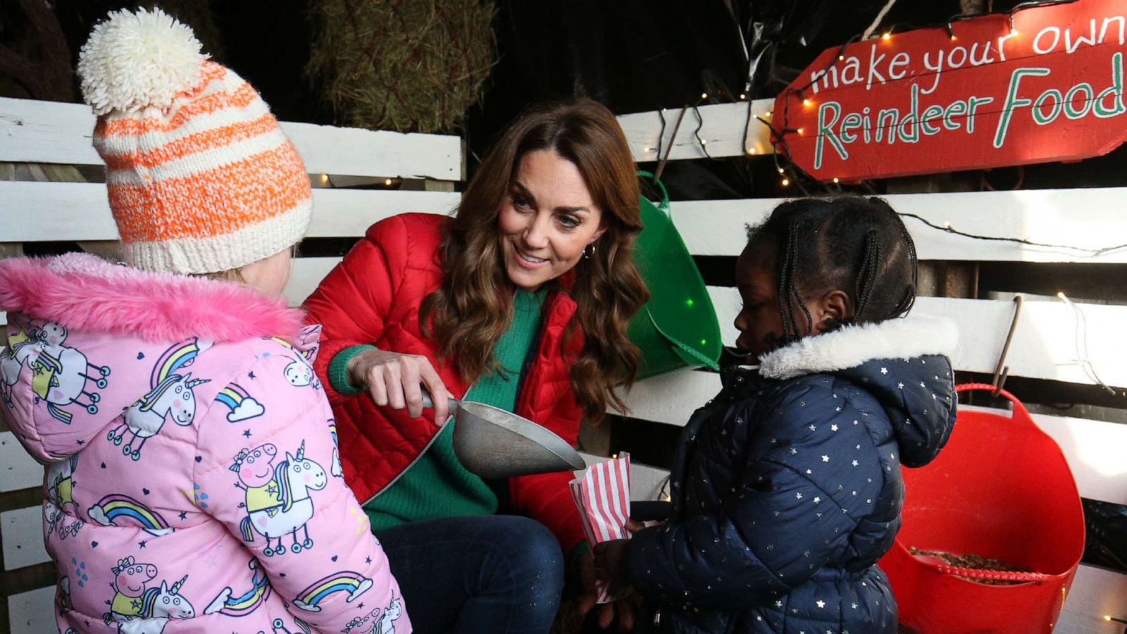 PHOTO: Catherine, Duchess of Cambridge hands out reindeer food to children during a visit to Peterley Manor Farm on Dec. 4, 2019 in Great Missenden, England.