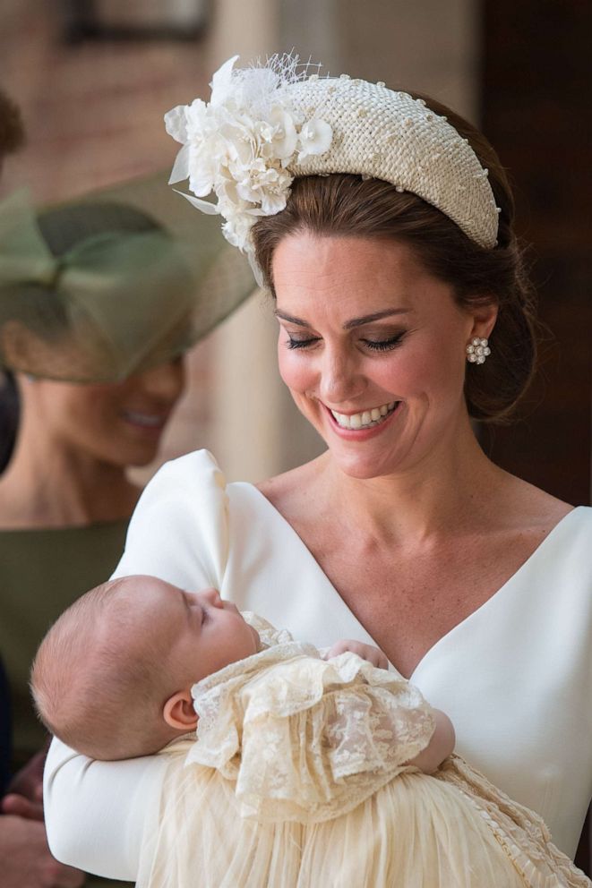 PHOTO: Catherine, Duchess of Cambridge carries Prince Louis as they arrive for his christening service at St James's Palace in London, July 09, 2018.