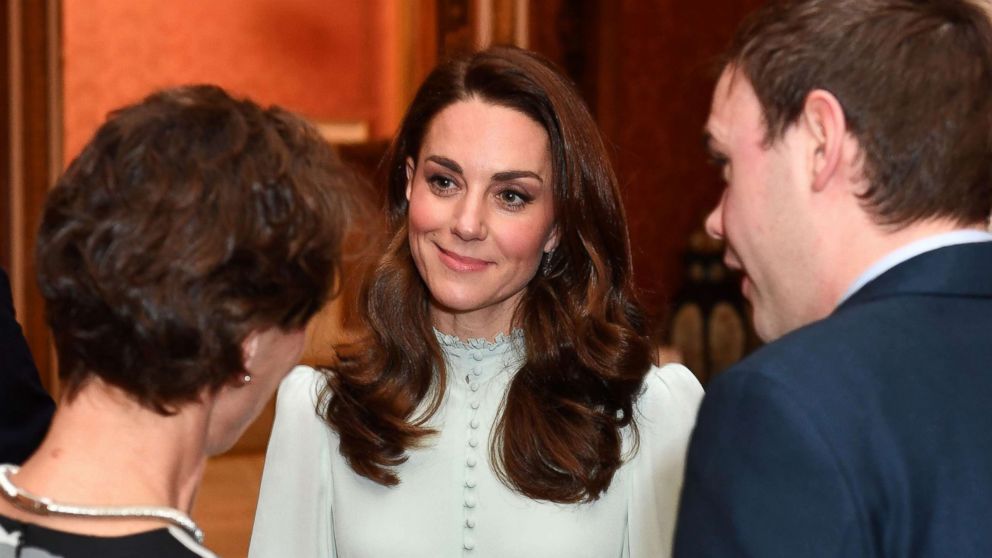 PHOTO: Catherine, Duchess of Cambridge, talks with guests as she attends a reception to mark the 50th Anniversary of the investiture of The Prince of Wales at Buckingham Palace in London, March 5, 2019.