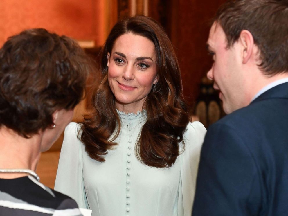 PHOTO: Catherine, Duchess of Cambridge, talks with guests as she attends a reception to mark the 50th Anniversary of the investiture of The Prince of Wales at Buckingham Palace in London, March 5, 2019.