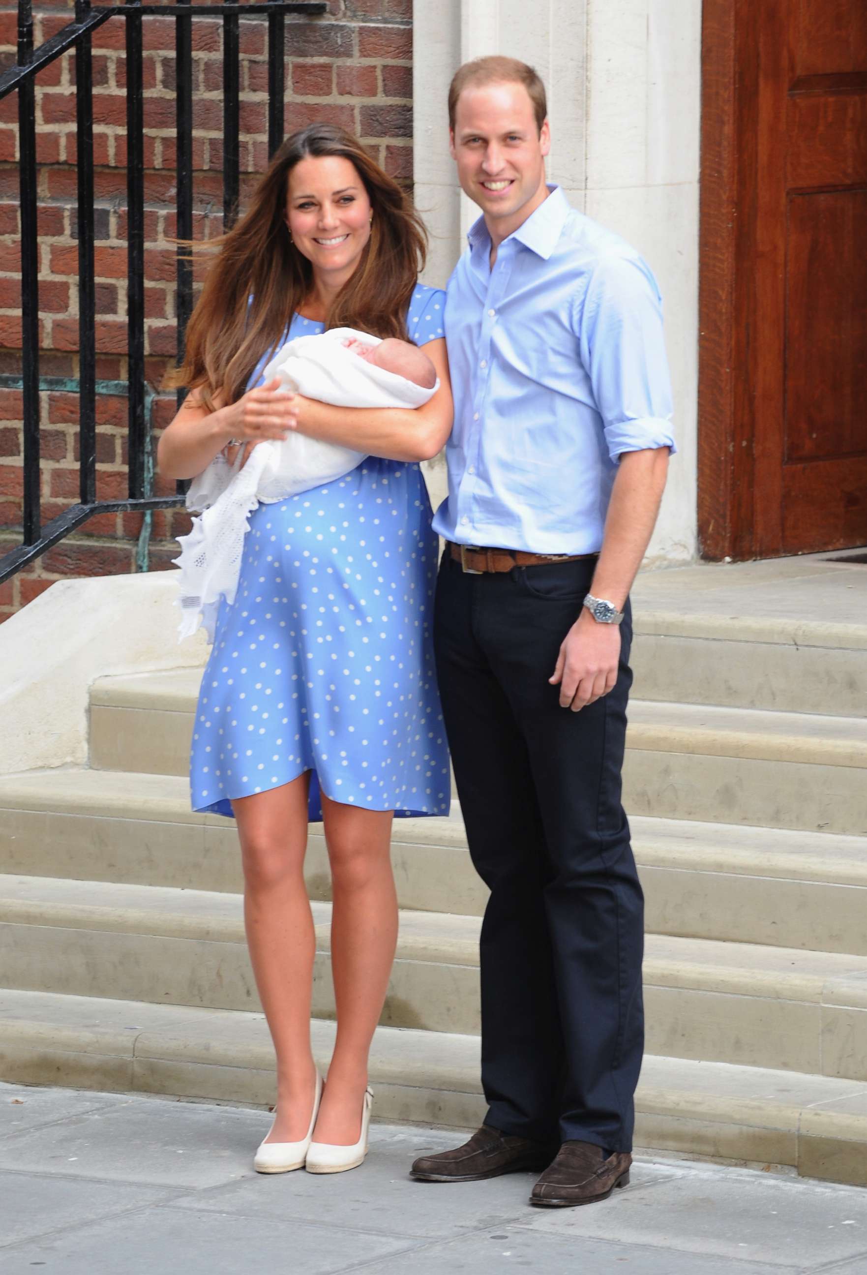 PHOTO: Catherine, Duchess of Cambridge and Prince William, Duke of Cambridge depart The Lindo Wing with their newborn son George at St Mary's Hospital on July 23, 2013 in London.