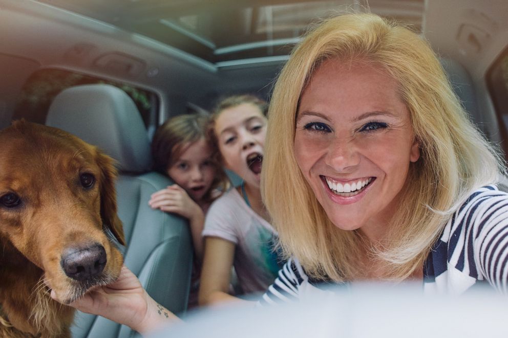 PHOTO: Photographer Kate T. Parker is pictured with her daughters and a golden retriever in an undated handout photo.