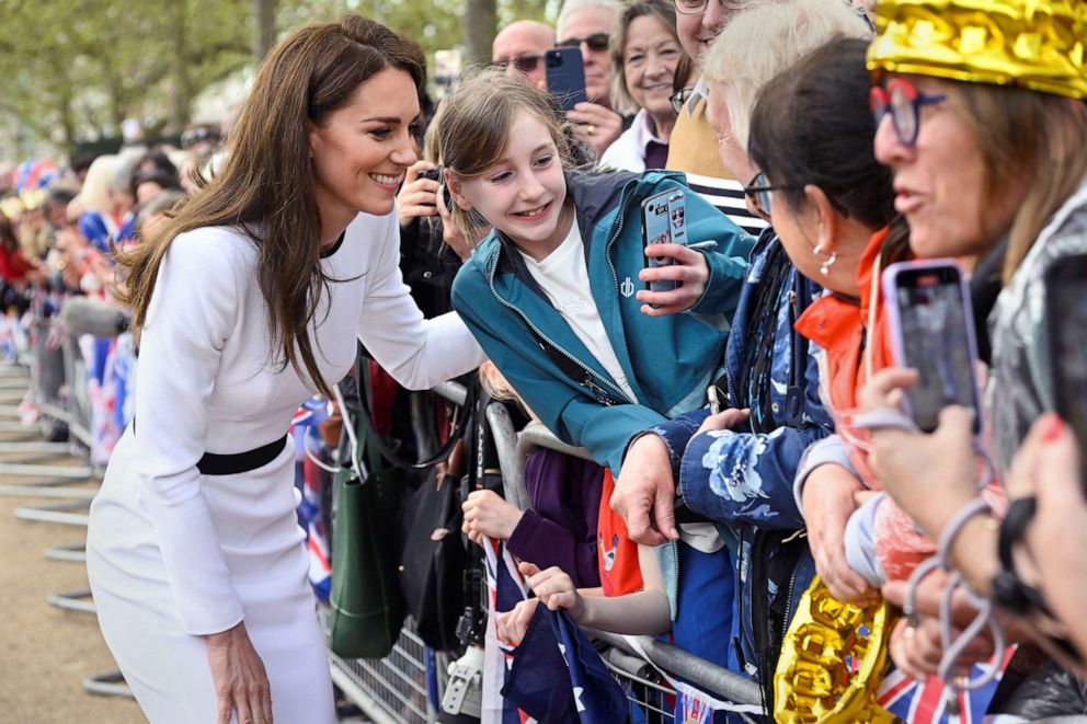 PHOTO: Britain's Catherine, Princess of Wales, meets well-wishers during a walkabout outside Buckingham Palace ahead of the coronation of Britain's King Charles and Camilla, Queen Consort, in London, May 5, 2023.