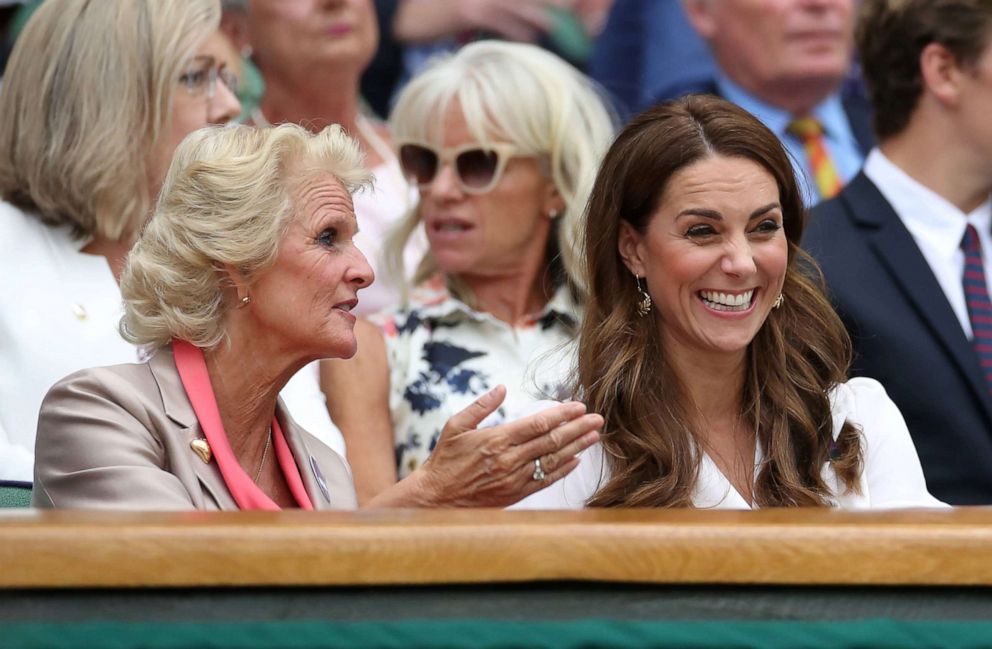 PHOTO: Britain's Catherine, Duchess of Cambridge, watches from the Royal Box ahead of the first round match between Germany's Tatjana Maria and Angelique Kerber.