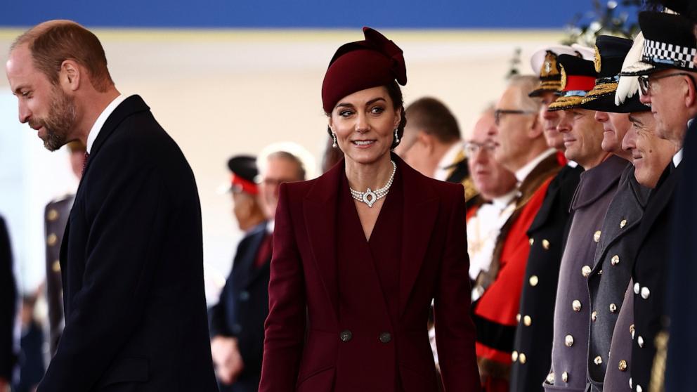 PHOTO: Britain's Catherine, Princess of Wales greets dignitaries as she arrives ahead of a Ceremonial Welcome for the Emir of Qatar at Horse Guards Parade in London, Dec. 3, 2024.