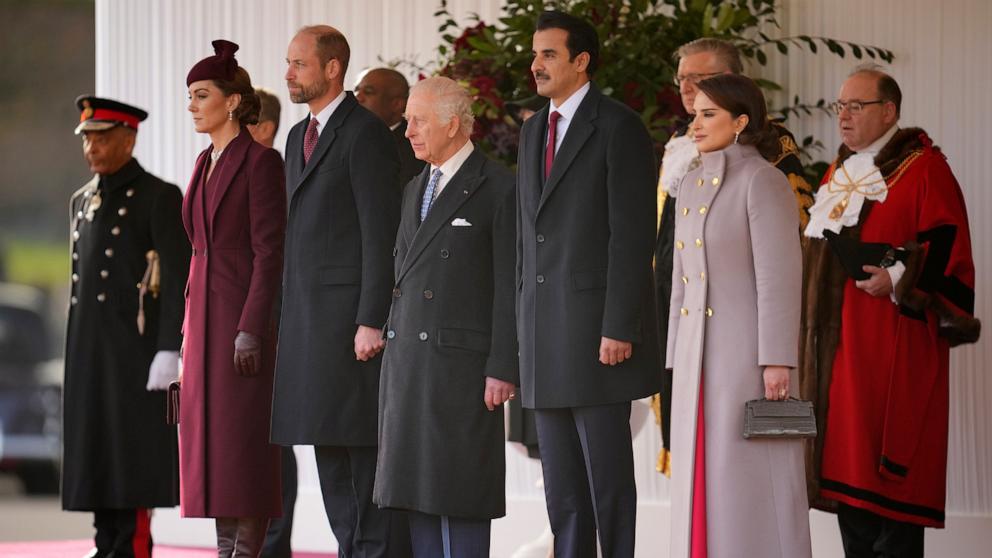 PHOTO: Kate, Princess of Wales, Prince William and King Charles III, from left, welcome the Emir of the State of Qatar Sheikh Tamim bin Hamad Al Thani, second right, and Sheikha Jawaher bint Hamad bin Suhaim Al Thani in London, Dec. 3, 2024.