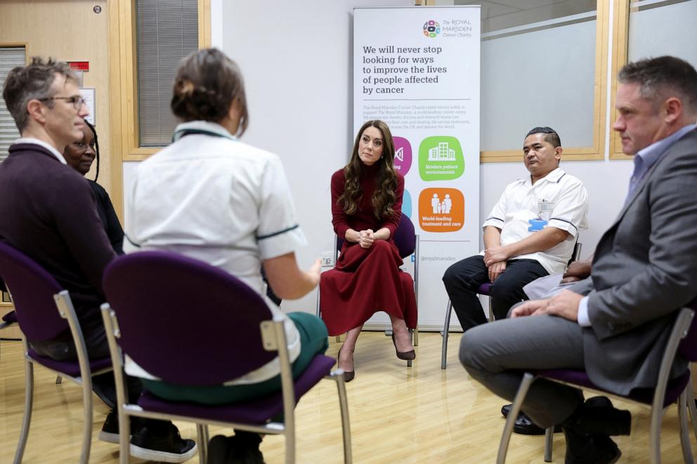 PHOTO: Catherine, Princess of Wales listens to staff members as she visits The Royal Marsden Hospital on Jan. 14, 2025 in London.