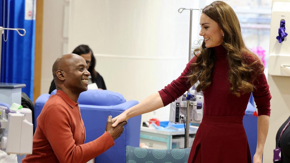 PHOTO: Britain's Catherine, Princess of Wales shakes hands with with Peter Burton during a visit to the Royal Marsden Hospital in west London on Jan. 14, 2025.