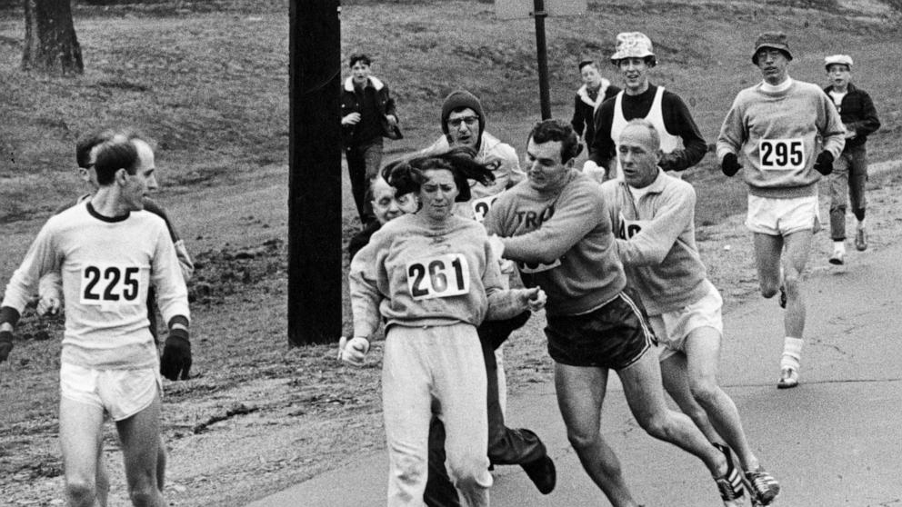 PHOTO: In this April 19, 1967, file photo, Kathrine Switzer, of Syracuse, N.Y., center, was spotted early in the Boston Marathon by Jock Semple, center right, who tried to rip the number off her shirt and remove her from the race. 