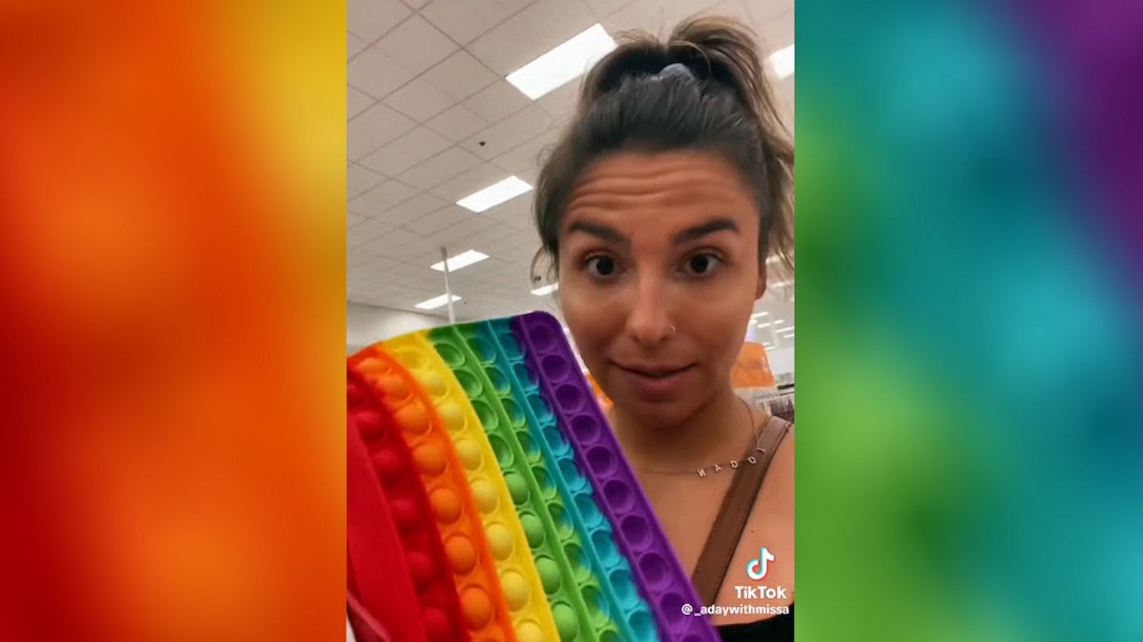 PHOTO: Teacher Katie Alburger holds up a fidget tool while shopping for back-to-school supplies.