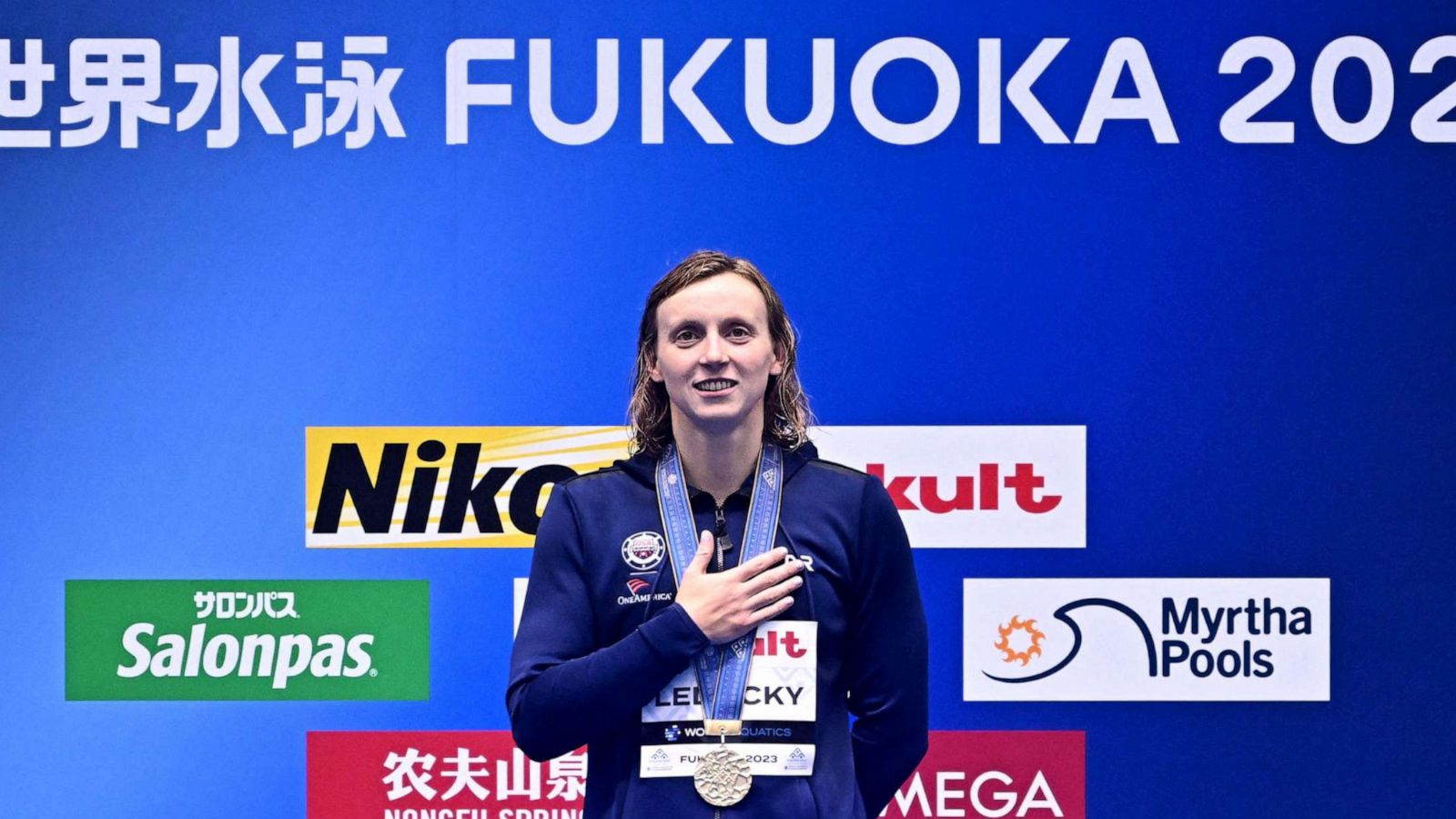 PHOTO: Gold medallist USA's Katie Ledecky attends the medals ceremony for the women's 1500m freestyle swimming event during the World Aquatics Championships in Fukuoka on July 25, 2023.