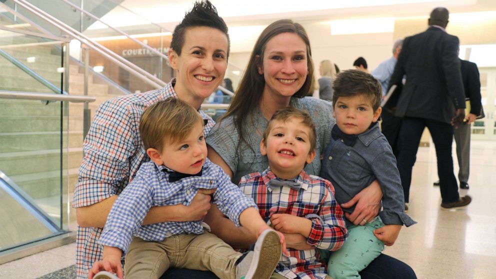 PHOTO: KC and Lena Currie are pictured with their sons, Noah, Joey and Logan on National Adoption Day in Worcester, Mass., Nov. 22, 2019.