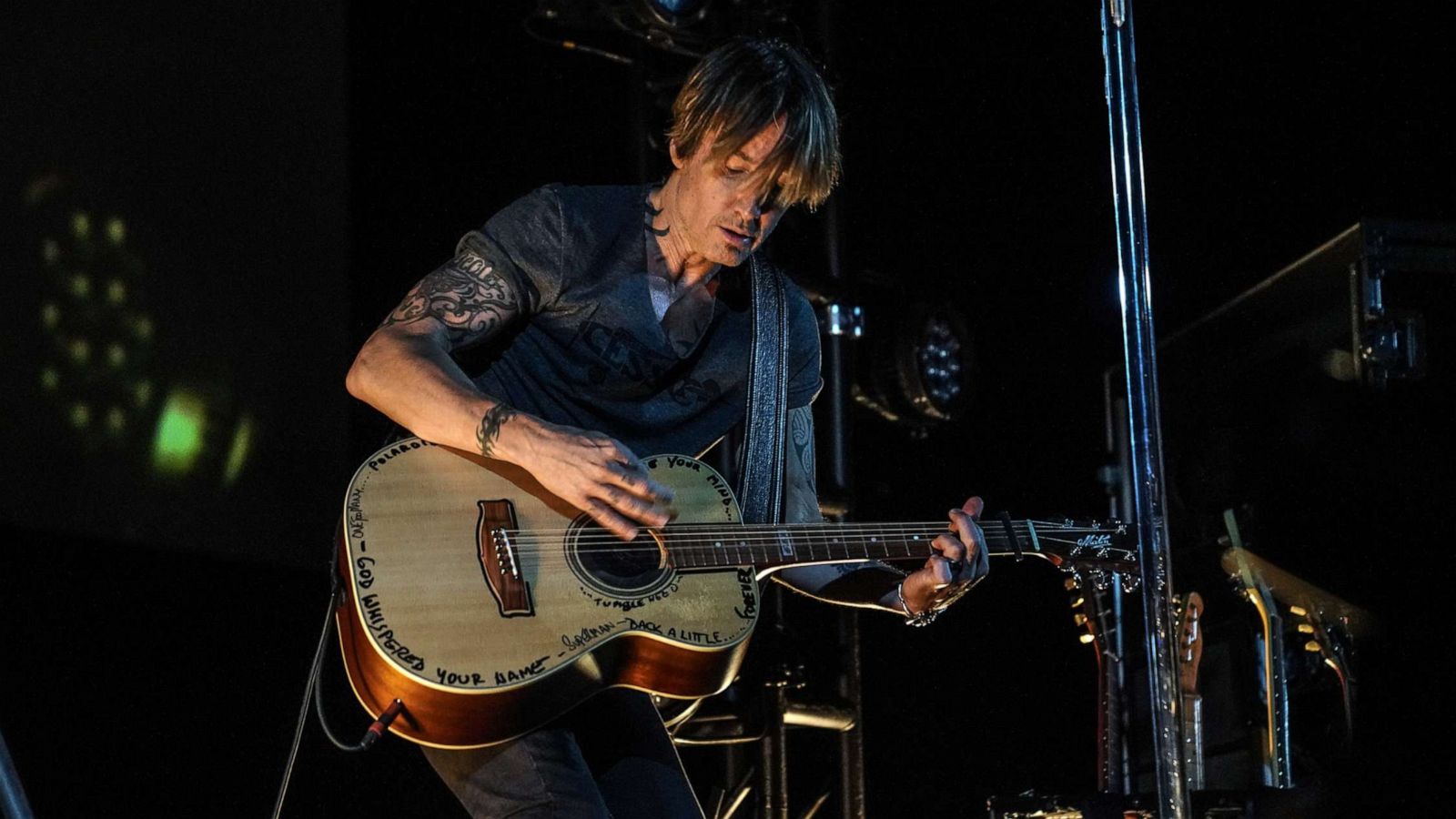 PHOTO: Keith Urban performs a concert for first responders at a drive-in theater outside Nashville on May 14, 2020.