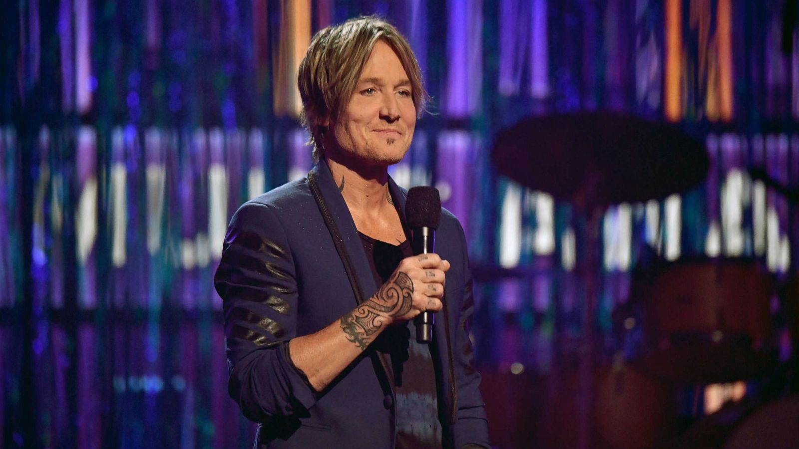 PHOTO: Co-host Keith Urban speaks onstage at the 56th Academy of Country Music Awards at the Grand Ole Opry, April 18, 2021, in Nashville, Tenn.