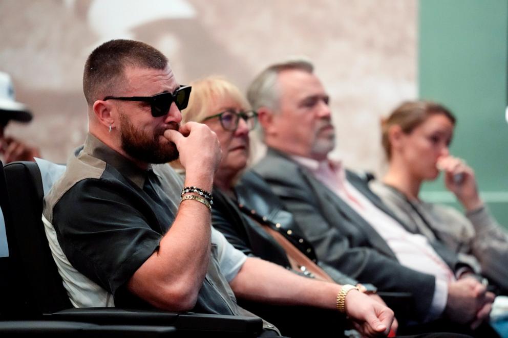 PHOTO: Philadelphia Eagles' Jason Kelce's family, from left, Kansas City Chiefs' Travis, mother, Donna, father, Ed, and wife, Kylie, listens as Jason Kelce announces his retirement at an NFL football press conference in Philadelphia, March 4, 2024. 